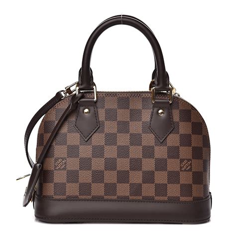 louis vuitton lv damier ebene de alma bb|louis vuitton with braided strap.